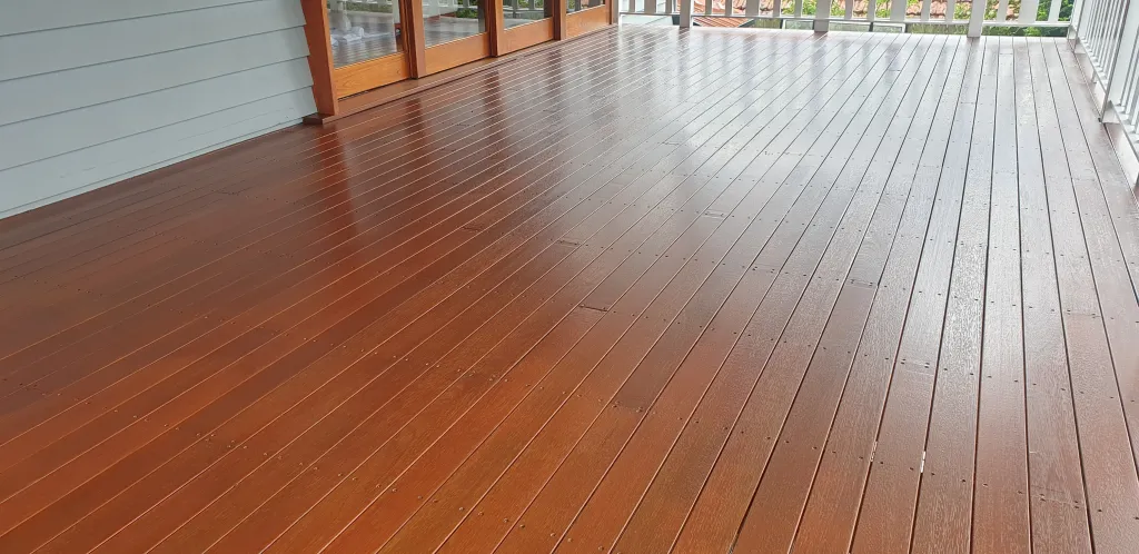 Outstanding deck rejuvenation result, allowed to fully dry for a couple days, before moving furniture and family life back onto the deck.