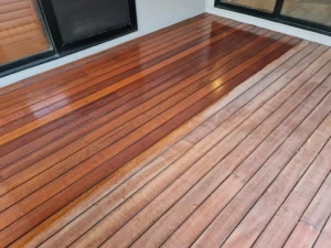 Heavy strip sanding done to deck before applying deck coating.