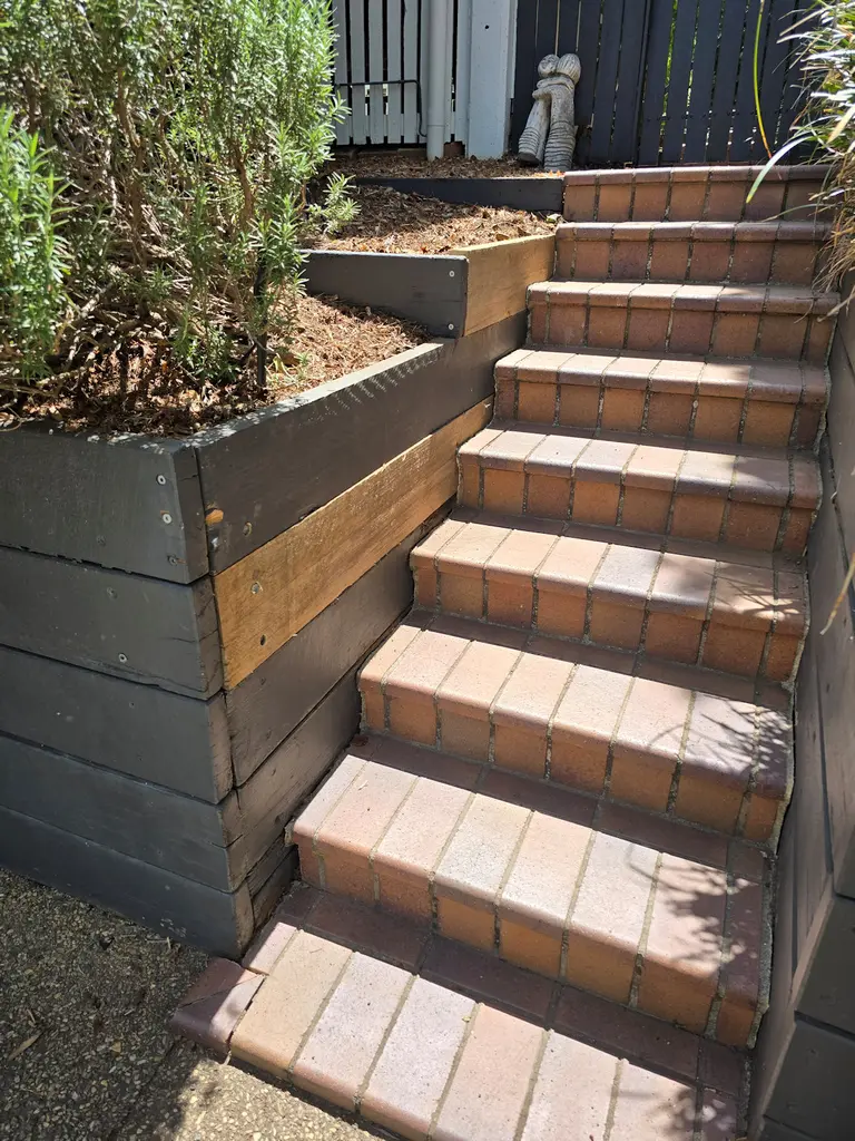 Rotten sleepers in retaining wall replaced with new.